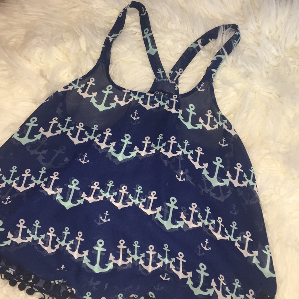 A women’s blue and teal anchor tank.